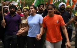 Bajrang Punia (left) joined wrestlers Vinesh Phogat, Sakshi Malik and Sangeeta Phogat on a protest march against the federation chief a year ago