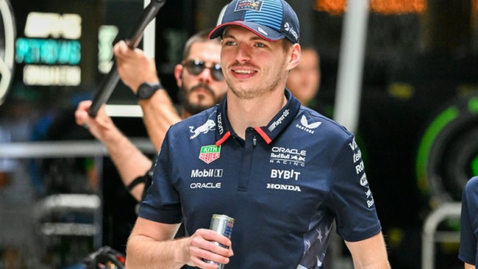 Red Bull Racing's Dutch driver Max Verstappen walks in the paddock ahead of the 2024 Miami Formula One Grand Prix. 