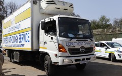 A forensic pathology vehicle arrives at Diepkloof Forensic Laboratory in Soweto carrying victims of the Johannesburg CBD fire. APF/Phill Magakoe